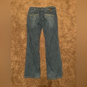 Cowgirl tuff breathe light size 32x35